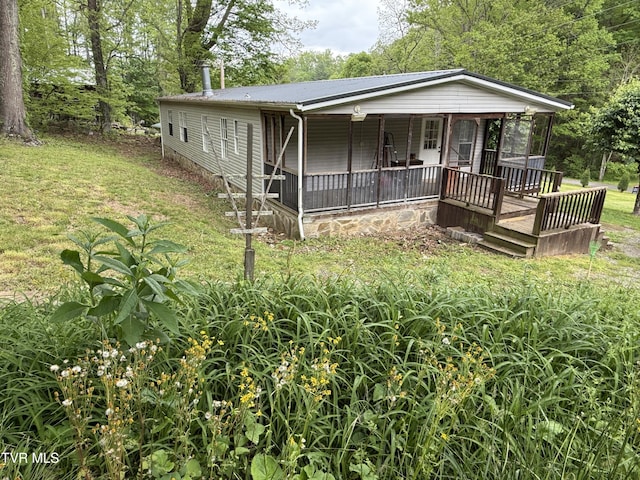 136 Gentry Mountain Rd, Erwin, TN 37650 - view of front of property featuring covered porch and a front yard