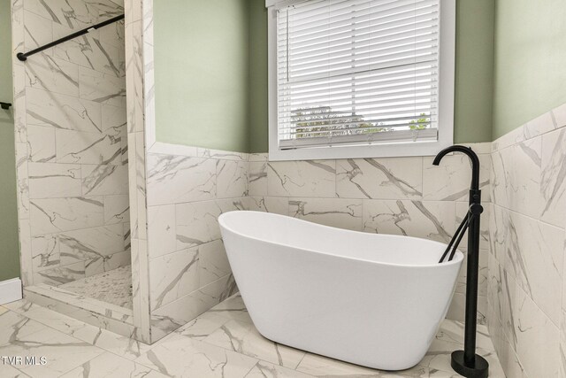 14737 Washington Way, Bristol, VA 24202 - full bathroom featuring tile walls and marble finish floor