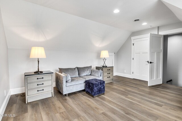 14737 Washington Way, Bristol, VA 24202 - living area featuring baseboards, recessed lighting, lofted ceiling, and wood finished floors