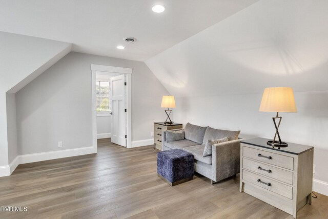 14737 Washington Way, Bristol, VA 24202 - living area featuring baseboards, recessed lighting, light wood finished floors, and lofted ceiling
