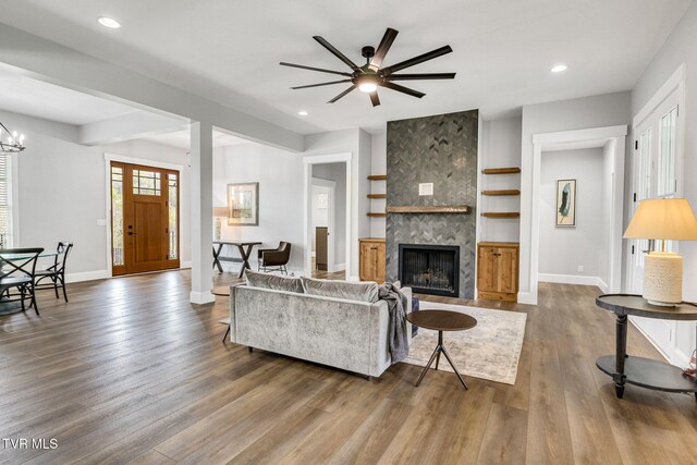 14737 Washington Way, Bristol, VA 24202 - living area featuring a fireplace, recessed lighting, baseboards, and dark wood-type flooring