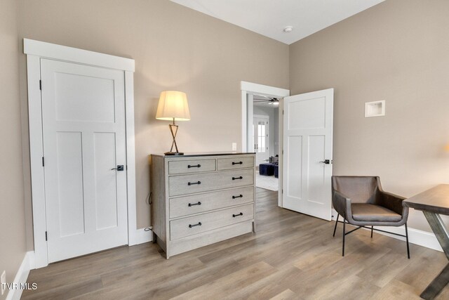 14737 Washington Way, Bristol, VA 24202 - living area with baseboards, a ceiling fan, and light wood finished floors