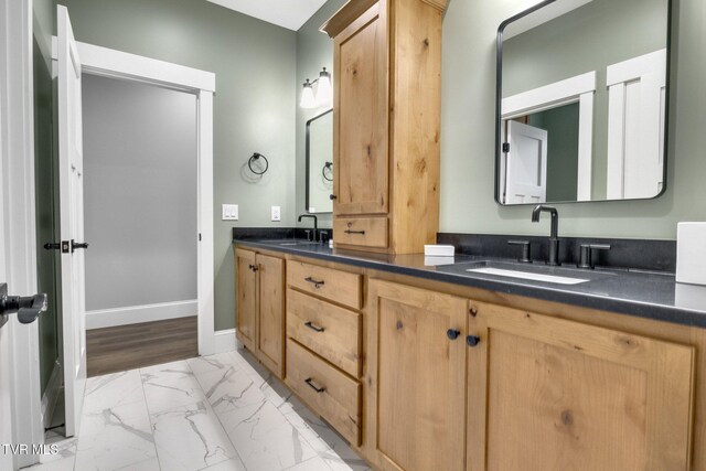 14737 Washington Way, Bristol, VA 24202 - full bath featuring double vanity, a sink, marble finish floor, and baseboards