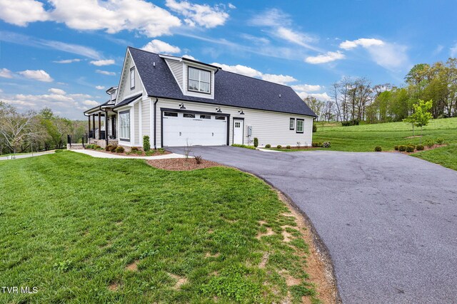 14737 Washington Way, Bristol, VA 24202 - view of side of home with roof with shingles, an attached garage, a yard, and aphalt driveway
