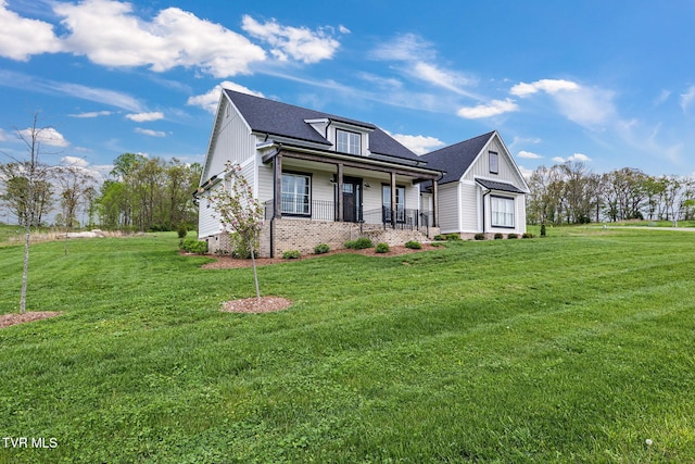 14737 Washington Way, Bristol, VA 24202 - view of side of home with a porch, a shingled roof, and a yard