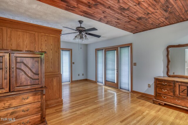 1010 Heaton Creek Rd, Roan Mountain, TN 37687 - interior space with light wood-type flooring, baseboards, ceiling fan, and access to exterior