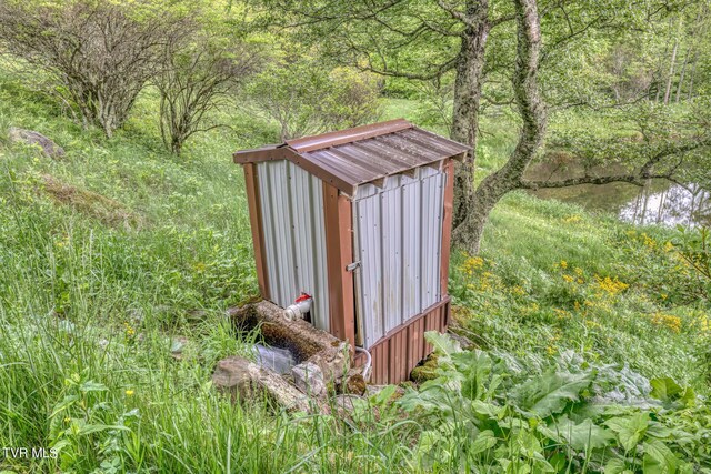 1010 Heaton Creek Rd, Roan Mountain, TN 37687 - view of shed with a forest view