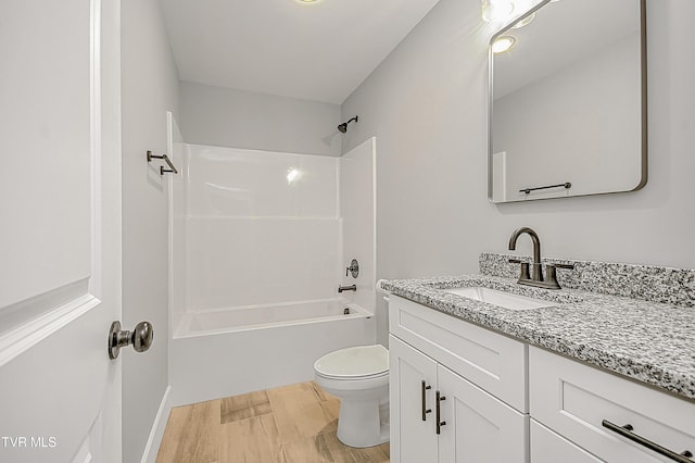 full bath with vanity, toilet, and shower / bathtub combination