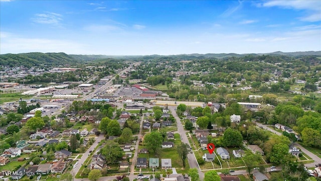 birds eye view of property featuring a mountain view and a residential view