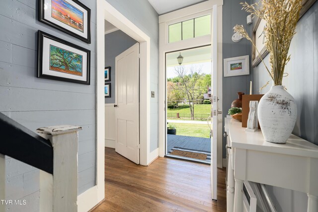 foyer entrance with wood finished floors