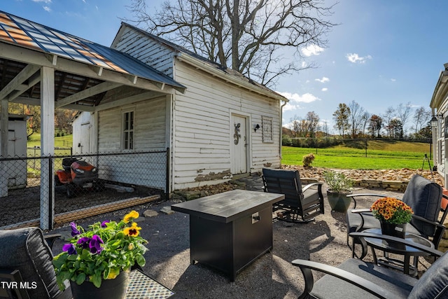 view of patio featuring fence