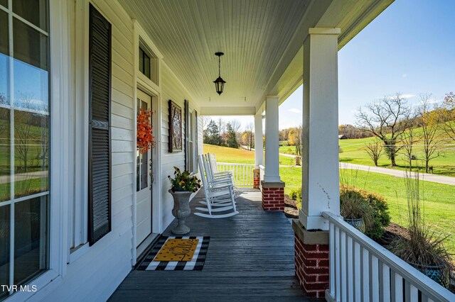 deck featuring a porch