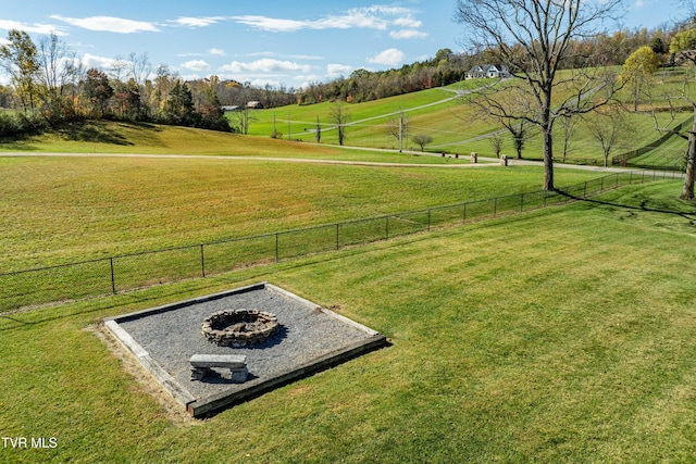 exterior space with a rural view and fence