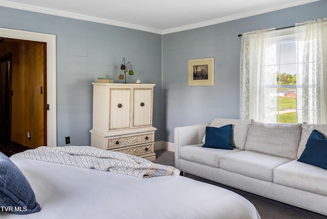 carpeted bedroom featuring multiple windows and crown molding