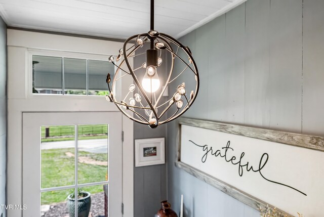 details featuring a chandelier