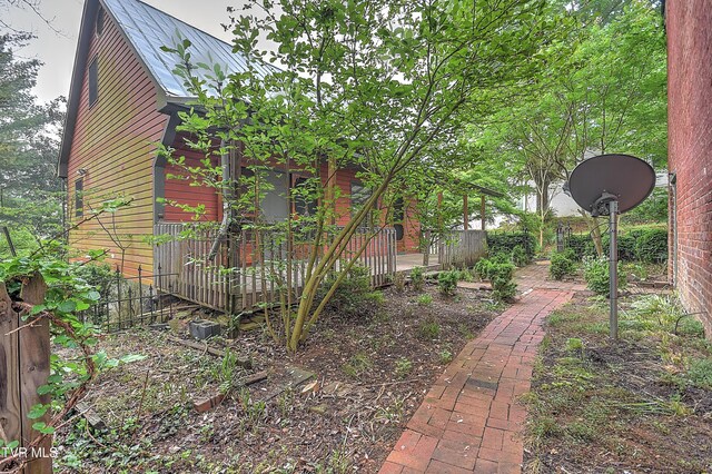 view of yard with a deck