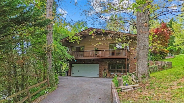1902 Lamont St, Kingsport, TN 37664 - chalet / cabin with driveway, brick siding, and an attached garage