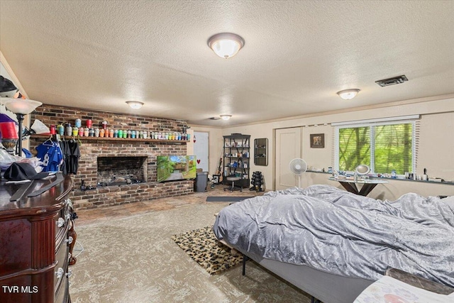 1902 Lamont St, Kingsport, TN 37664 - bedroom with a textured ceiling, visible vents, and a brick fireplace