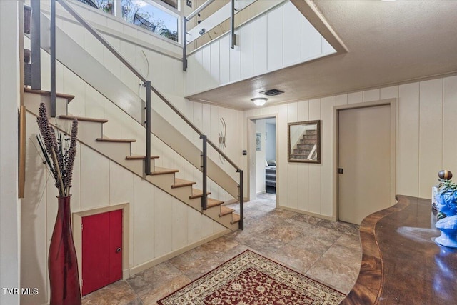 1902 Lamont St, Kingsport, TN 37664 - entrance foyer with stairway, visible vents, and stone finish floor