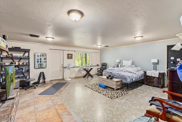 1902 Lamont St, Kingsport, TN 37664 - bedroom with a textured ceiling, visible vents, and ornamental molding