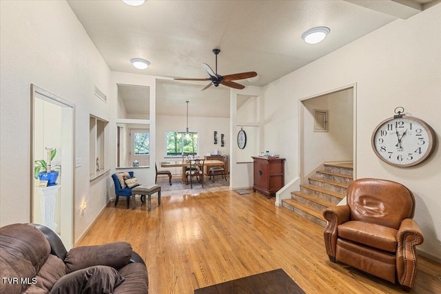 1902 Lamont St, Kingsport, TN 37664 - living area featuring light wood-style floors, ceiling fan, and stairs