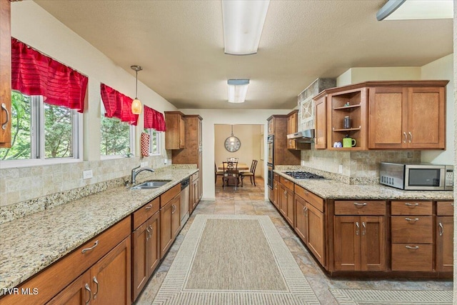 1902 Lamont St, Kingsport, TN 37664 - kitchen featuring brown cabinets, open shelves, decorative backsplash, a sink, and stainless steel appliances