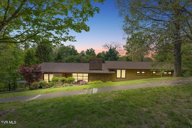 1902 Lamont St, Kingsport, TN 37664 - view of front of home featuring a chimney and a front yard