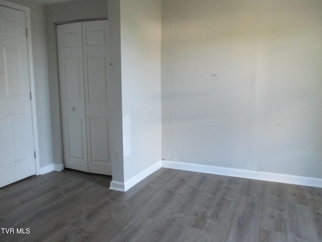1209 Golf St, Bristol, TN 37620 - spare room with wood finished floors and baseboards
