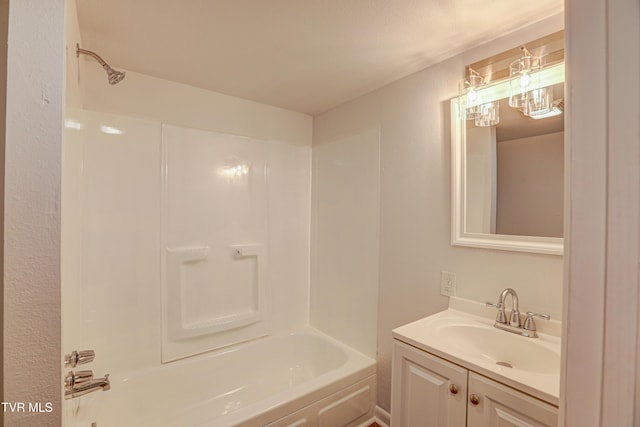 full bath featuring vanity and tub / shower combination