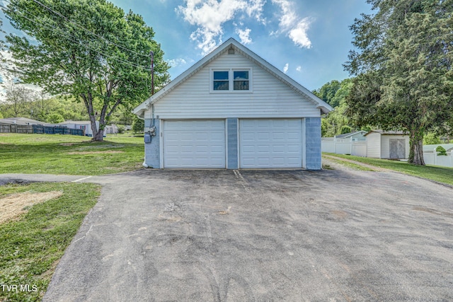 detached garage with fence