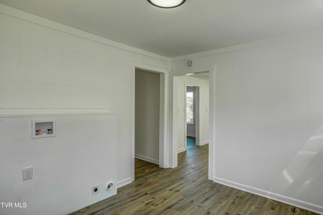 laundry room featuring electric dryer hookup, baseboards, washer hookup, and wood finished floors