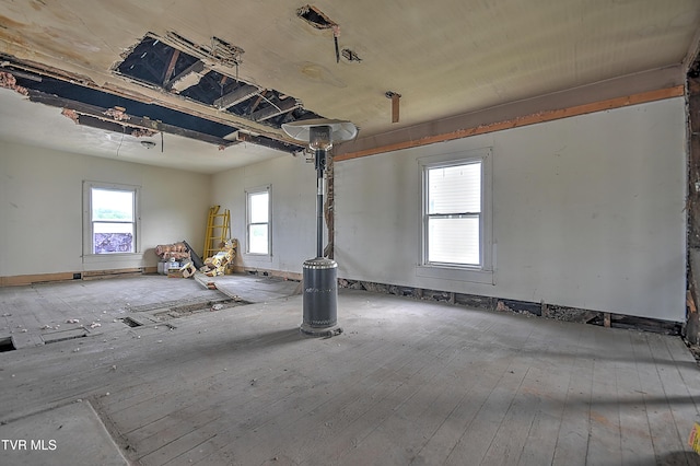 spare room with hardwood / wood-style flooring
