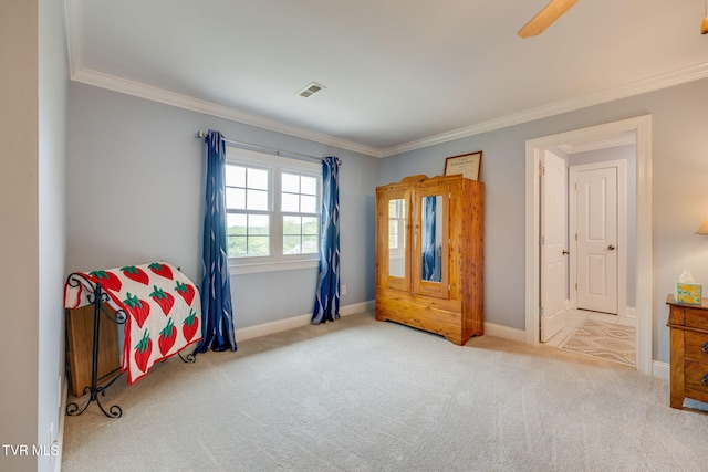 bedroom featuring ornamental molding, visible vents, carpet flooring, and baseboards