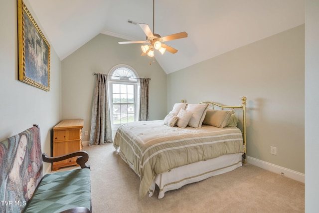 bedroom with light colored carpet, ceiling fan, vaulted ceiling, and baseboards