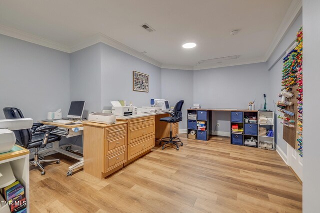 office featuring ornamental molding, visible vents, and light wood finished floors