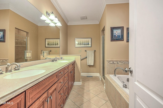 bathroom with a sink, visible vents, baseboards, tile patterned floors, and a garden tub