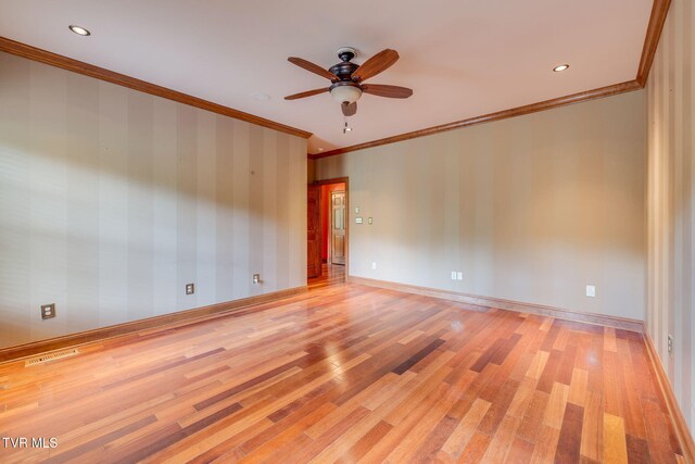unfurnished room featuring recessed lighting, ornamental molding, a ceiling fan, and light wood finished floors