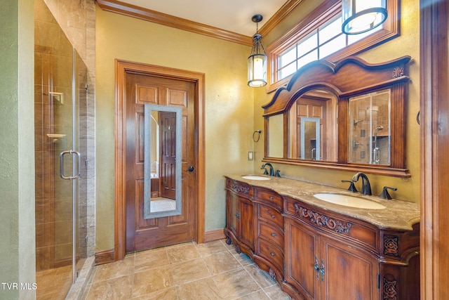 full bath featuring ornamental molding, double vanity, a sink, and a shower stall
