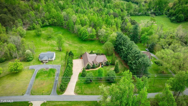 aerial view featuring a forest view