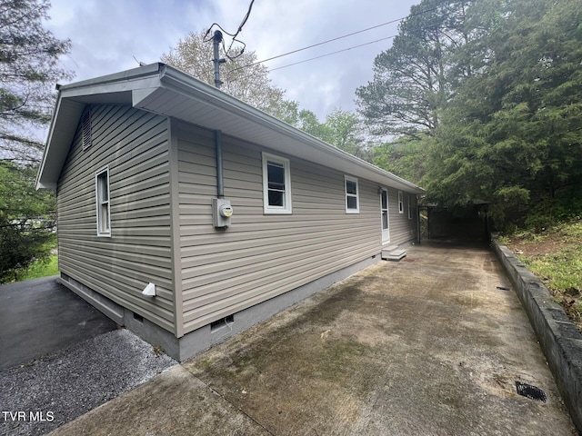 view of side of property featuring crawl space