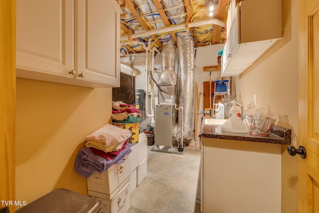 laundry room with cabinet space