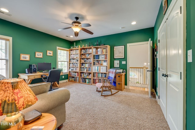 carpeted home office featuring recessed lighting, baseboards, ceiling fan, and visible vents