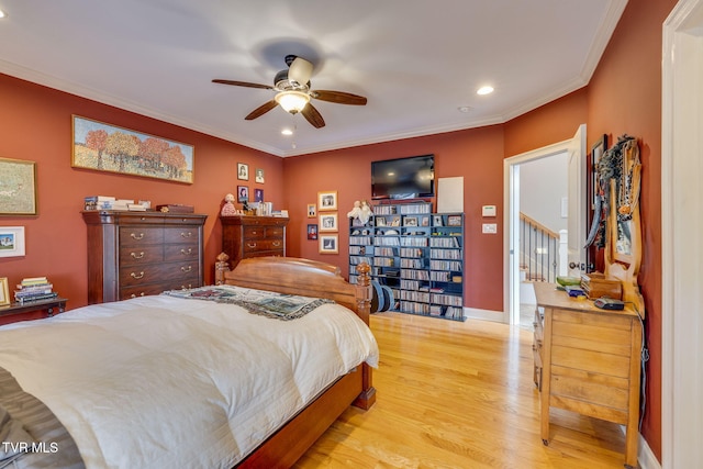 bedroom with ornamental molding, baseboards, recessed lighting, a ceiling fan, and light wood finished floors