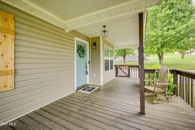 wooden terrace featuring a porch