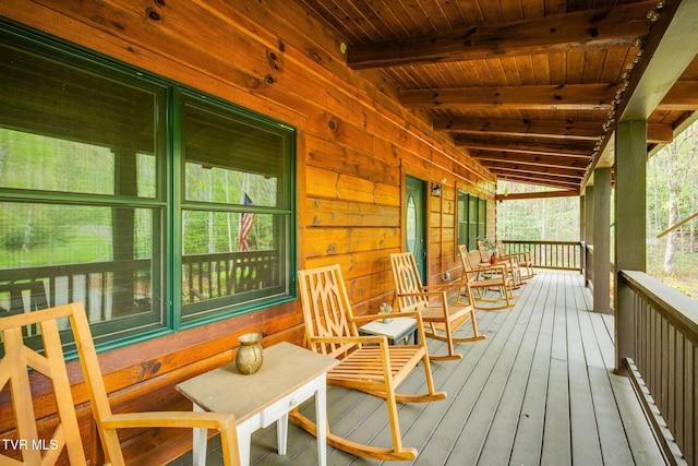 wooden terrace featuring covered porch