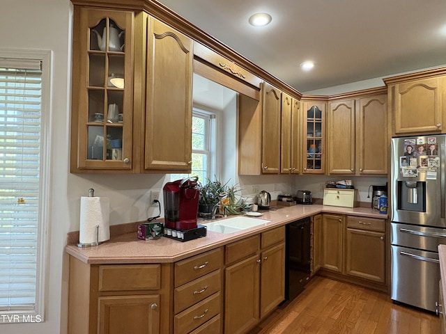 142 Oakwell Ln, Jonesborough, TN 37659 - kitchen with black dishwasher, stainless steel fridge, light countertops, and light wood-style floors
