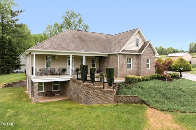 288 Max Jett Rd, Johnson City, TN 37601 - rear view of house with a patio, a shingled roof, a yard, and brick siding