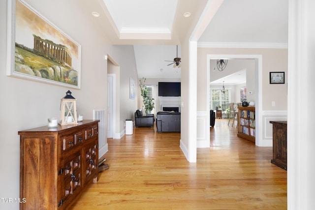 288 Max Jett Rd, Johnson City, TN 37601 - hallway featuring crown molding, light wood finished floors, and a notable chandelier