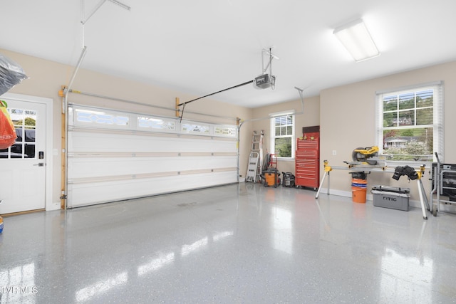 288 Max Jett Rd, Johnson City, TN 37601 - garage featuring baseboards and a garage door opener