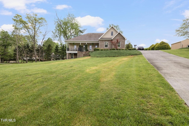 288 Max Jett Rd, Johnson City, TN 37601 - view of front facade with brick siding, a front lawn, and driveway
